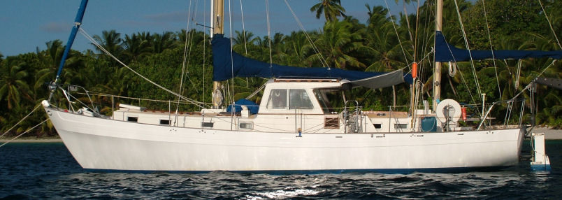 The full side view of Condesa at anchor